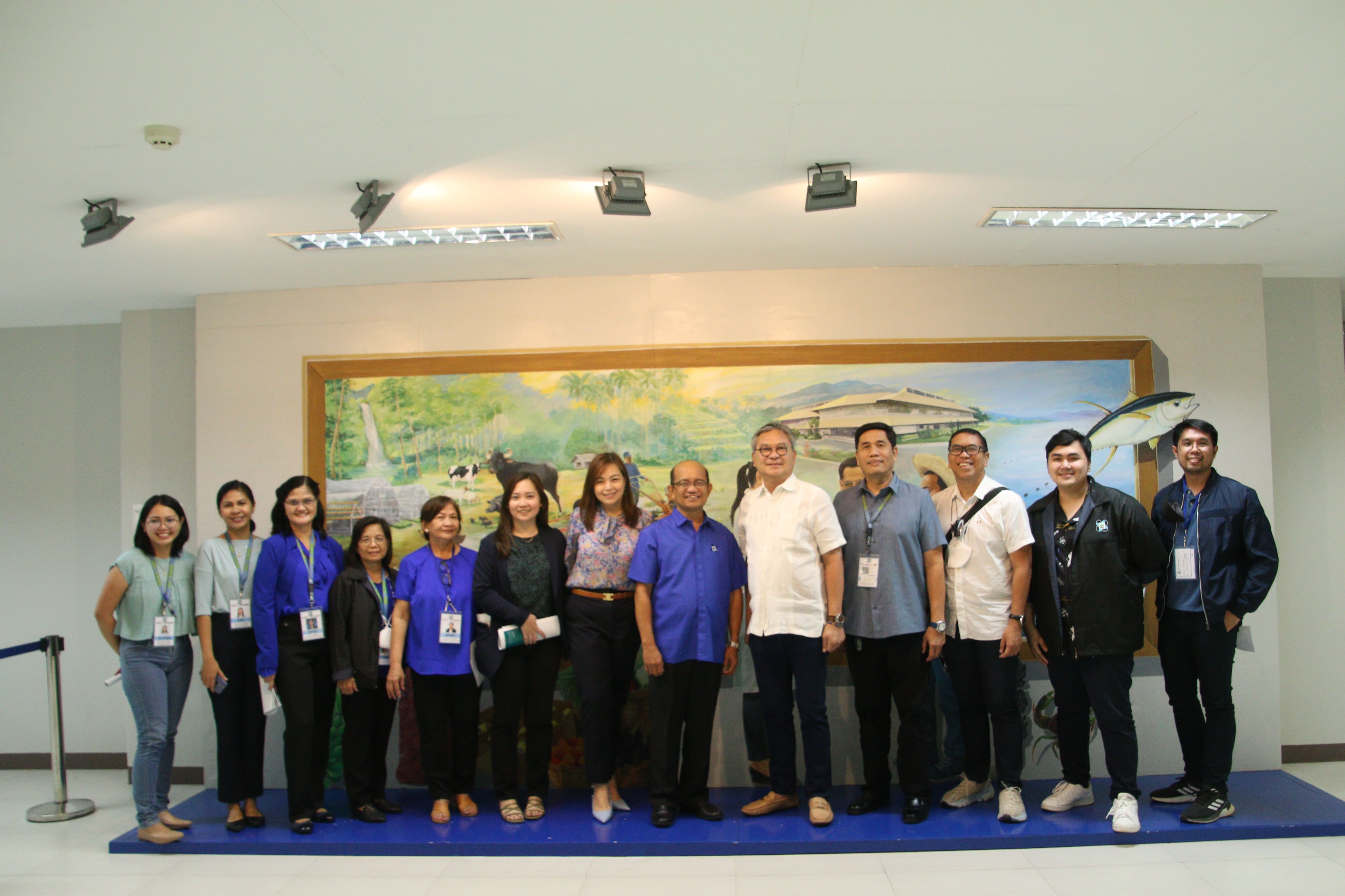 Congressman &quot;Eddiebong&quot; Plaza poses with DOST-PCAARRD Executive Director Dr. Reynaldo V. Ebora, DOST-PCAARRD Deputy Executive Director for ARMSS Dr. Melvin B. Carlos, Chief-of-Staff (COS) Atty. Jaybe Quiñonez, Ms. Patricia Anne Plaza, Ms. Ron Santiago, and PCAARRD staff in the DPITC exhibit area Image credit: Mr. Paul Czesar Katimbang , ACD, DOST-PCAARRD