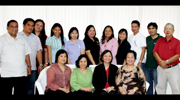 The Swine Respiratory Project Team and evaluators.: At the back (from left to right): Dr. Edwin Villar, national coordinator ;; Dr. Jose Eduardo David, project veterinarian; Ms. Marites Gealone, Animal Health Division–Bureau of Animal Industry  (AHD-BAI); Ms. Helen Valerie Corales, project communication officer; Dr. Suzanneth Lola, project veterinary pathologist; Dr. Lilia Retes, Philippine Animal Health Center (PAHC)-BAI; Dr. Milagros Mananggit OF RADDL-DA-RFU 3; Dr. Rachel Azul, lead researcher for laboratory disease diagnosis at PAHC-BAI; Dr. Eduardo Lapuz, lead researcher for field surveillance and diagnosis at RADDL 3; Mr .Ronilo De Castro, LRD-PCAARRD; Dr, Jose Molina, private veterinary consultant and panel member for the review.  Front: Dr. Lily Ann Lando, director, ACD-PCAARRD and panel member; Dr. Clarissa Domingo, lead researcher for LAMP and assistant professor, College of Veterinary Science and Medicine-CLSU; Dr. Veronica Matawaran, professor, CVM-UPLB and panel member; and Dr. Karen Rose Dazo, overall project leader and chief, AHD-BAI.