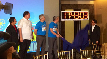 DOST Secretary Mario G. Montejo (second from right) unveils the official Philippine Standard Time (PhST) to highlight the signing of Republic Act 10535 or the Philippine Standard Time Act of 2013, together with its Implementing Rules and Regulations, and the observance of National Time Consciousness Week (NTCW) in ceremonies held in Quezon City. The digital clock in picture was used in the New Year’s Eve countdown and the debut of the NTCW. Also in picture from left are PAGASA Acting Administrator Vicente Malano, Presidential Communications Operations Office  Assistant Secretary Jess Q. Yu, DOST Assistant Secretary Raymund E. Liboro, and Rep. Magtanggol T. Gunigundo I of the 2nd District of Bulacan. (Photo by George Robert Valencia III, S&T Media Service, DOST-STII)