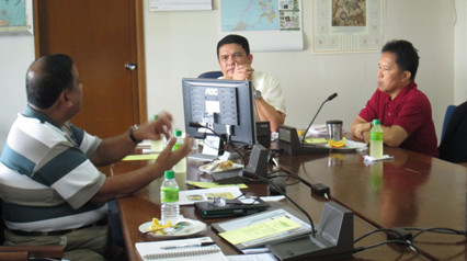 Dr. Villar (left) presents to Congressman Geron (center) the Livestock and Poultry ISP. Dr. Faylon (right) joined in the presentation. (Photo by Katrina Kae S. Principe, S&T Media Service)